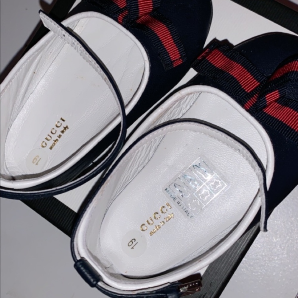 Infant Gucci shoes.